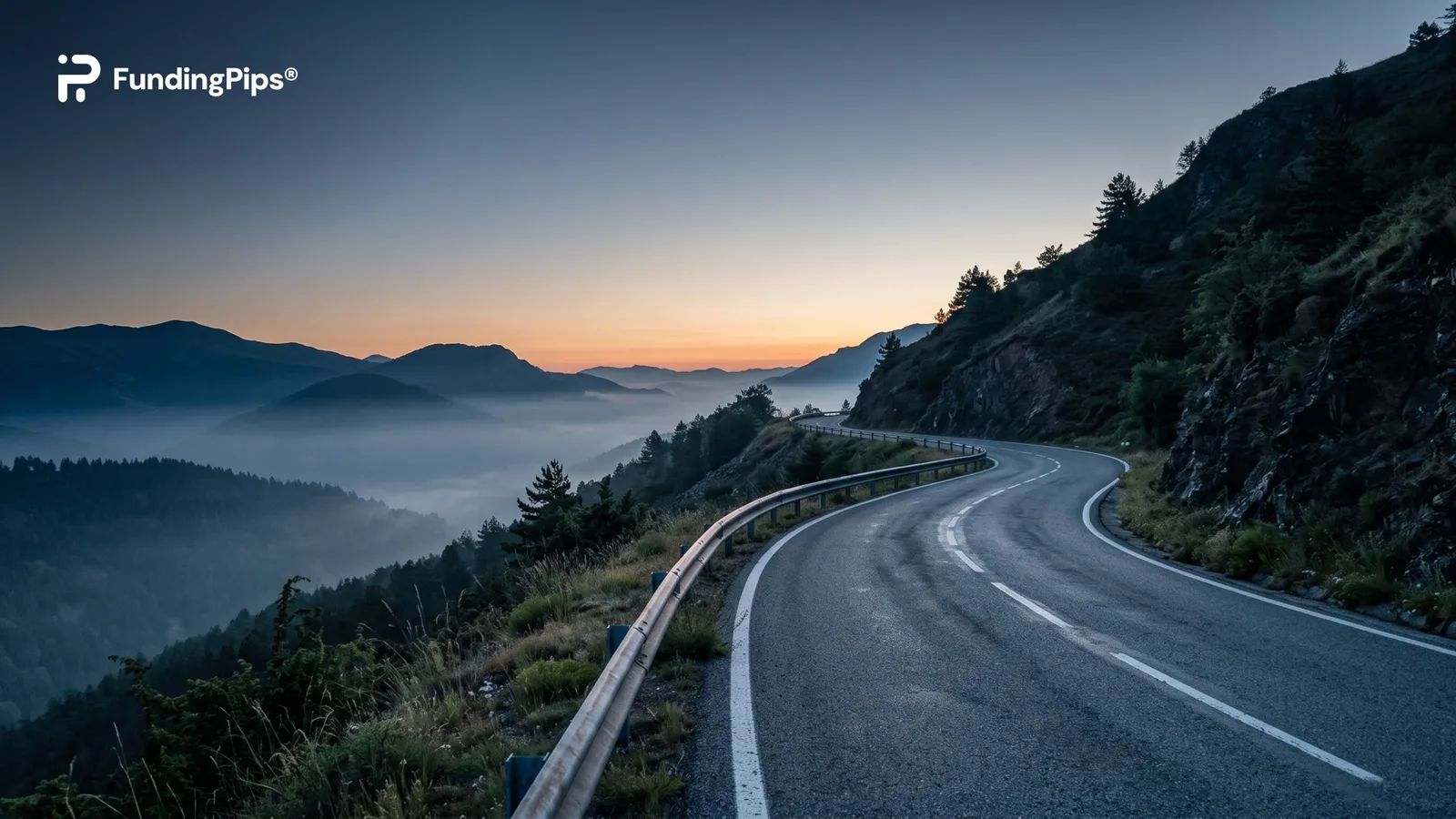 Winding mountain road with guardrails at dawn and the FundingPips logo, cover image for the FundingPips rules guide